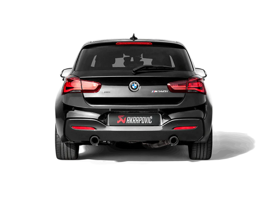 Rear view of a Black BMW M140i with Akrapovic exhausts