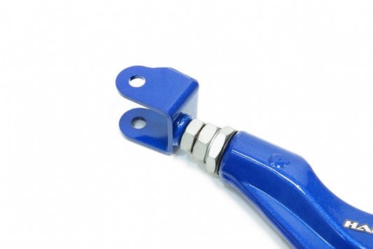 Close up view of the end of a blue Hardrace rear upper camber arm with the adjusting nuts & a bracket with a hole either side