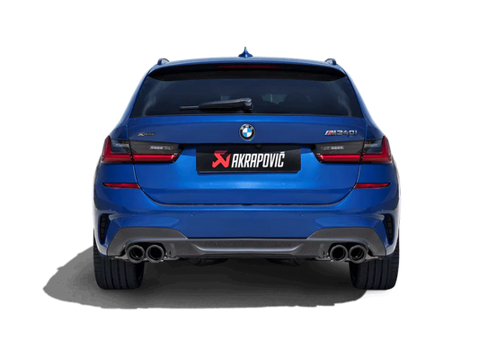 Rear view of a blue M340i Grand Coupe with an Akrapovic exhaust, twin pipes each side, fitted