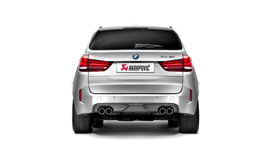 Rear view of a silver BMW X5M with an Akrapovič twin pipes each side exhaust & an Akrapovič carbon fibre rear diffuser fitted