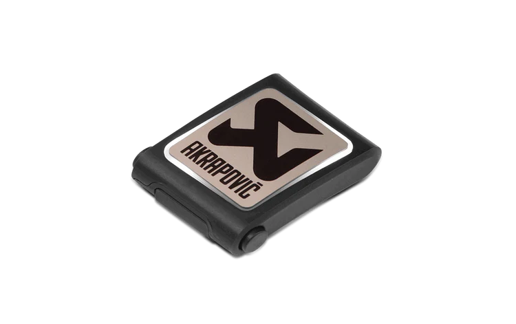 Akrapovič logo on a black remote control unit