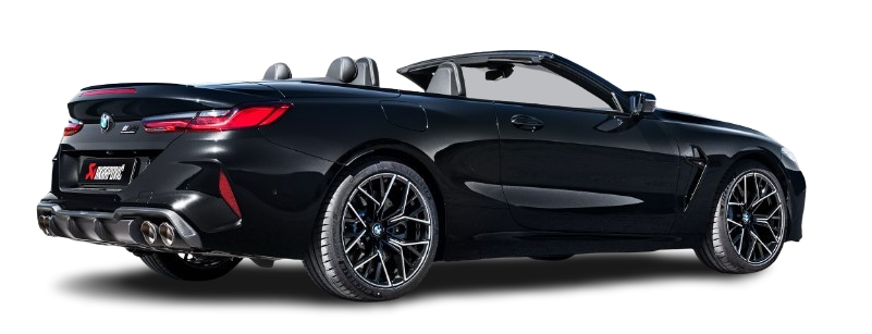 Offside rear view of a black BMW M8 with an Akrapovič exhaust, with twin pipes each side & rear carbon fibre diffuser, fitted