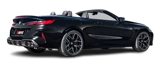 Offside rear view of a black BMW M8 with an Akrapovič exhaust, with twin pipes each side & rear carbon fibre diffuser, fitted