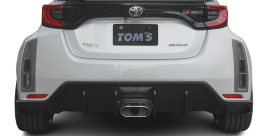 Rear view of a white Toyota GR Yaris with back trim, with a Tom's rear diffuser fitted