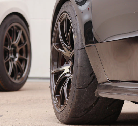 Front view of a Nankang AR-1 semi slick tyre fitted to a car & another in the background