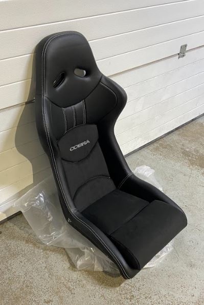 Aerial offside front view of a black Cobra Nogaro Circuit sports seat