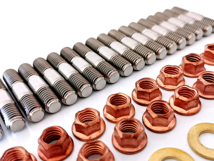 A close up image showing 17 Titanium threaded studs, 13 bronze nuts & a couple of washers