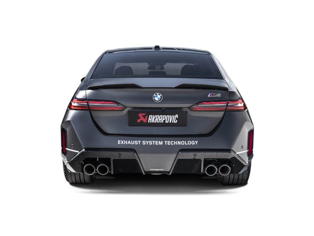 Close up of Akrapovic round tailpipe for BMW M5 G90 G99