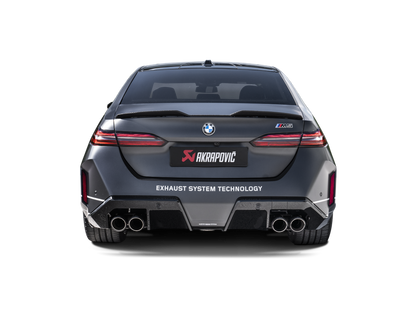 Close up of Akrapovic round tailpipe for BMW M5 G90 G99