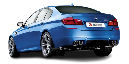 Near side rear view of a blue BMW M5 F10 with an Akrapovic exhaust, with twin pipes either side, fitted