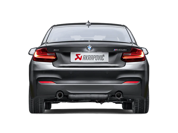 Rear view of a Grey BMW M240i with an Akrapovic Titanium rear exhaust with twin pipes & carbon fibre tips fitted