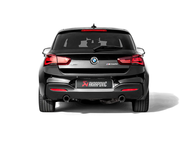 Rear view of a Black BMW M140i with Akrapovic exhausts