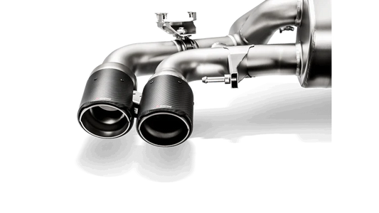 Close up view of an Akrapovic carbon fibre tail pipe set fitted to the rear exhaust section twin tail pipe 