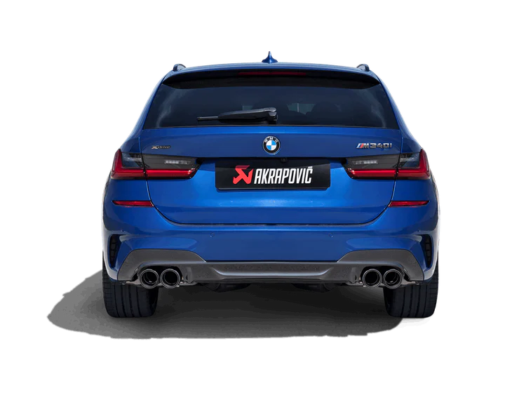 Rear view of a blue M340i Grand Coupe with an Akrapovic exhaust, twin pipes each side, fitted