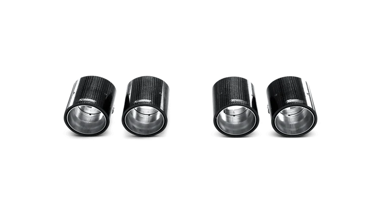 Four Akrapovic cylindrical overhead track lights on a black background.