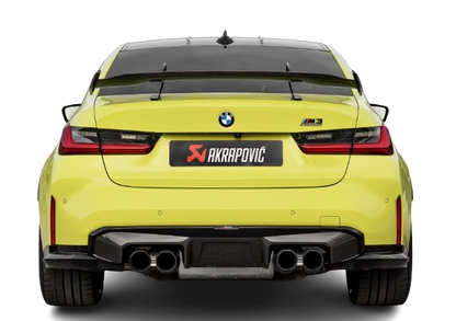 Rear view of a yellow BMW M3 with an Akrapovic exhaust, with twin pipes each side, a high gloss black rear diffuser & sports boor spoiler fitted