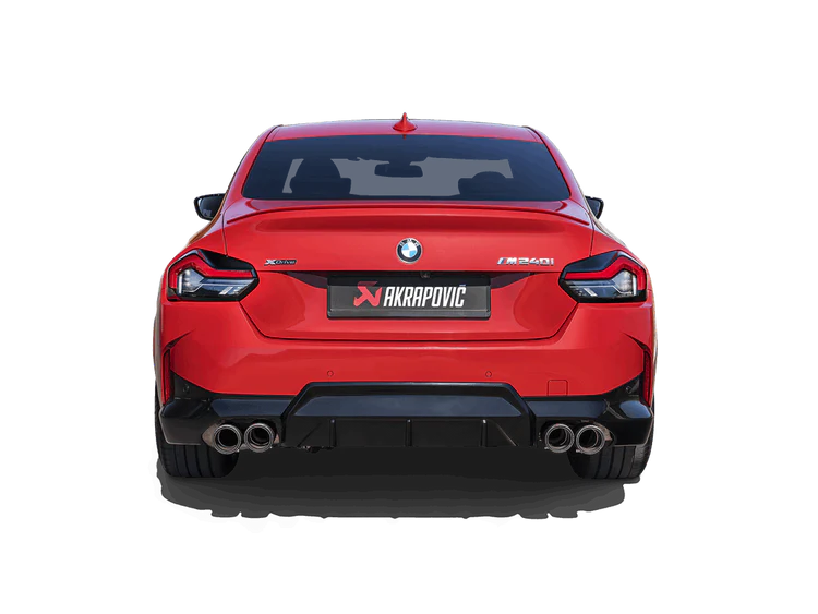 Rear view of a red BMW M240i with an Akrapovic Titanium rear exhaust, with twin pipes & carbon fibre tips each side, fitted 