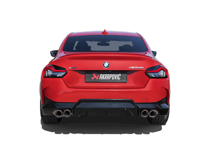 Rear view of a red BMW M240i with an Akrapovic Titanium rear exhaust, with twin pipes & carbon fibre tips each side, fitted 