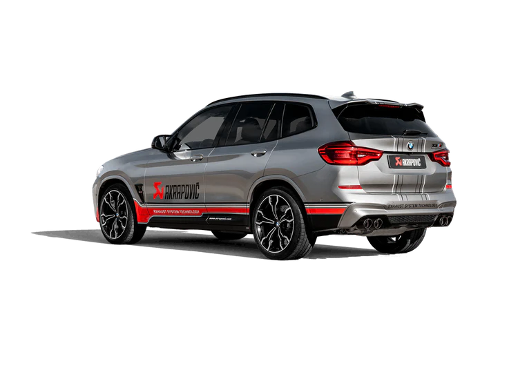 Nearside rear view of a silver BMW X3M with an Akrapovič twin pipes each side exhaust fitted