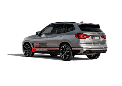 Nearside rear view of a silver BMW X3M with an Akrapovič twin pipes each side exhaust fitted