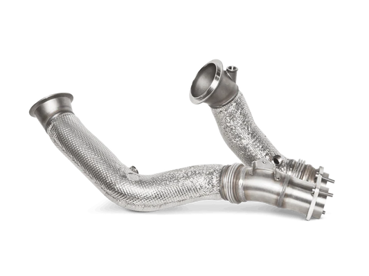 An Akrapovič downpipe with a heat-wrapped section for a BMW M2 M3 M4