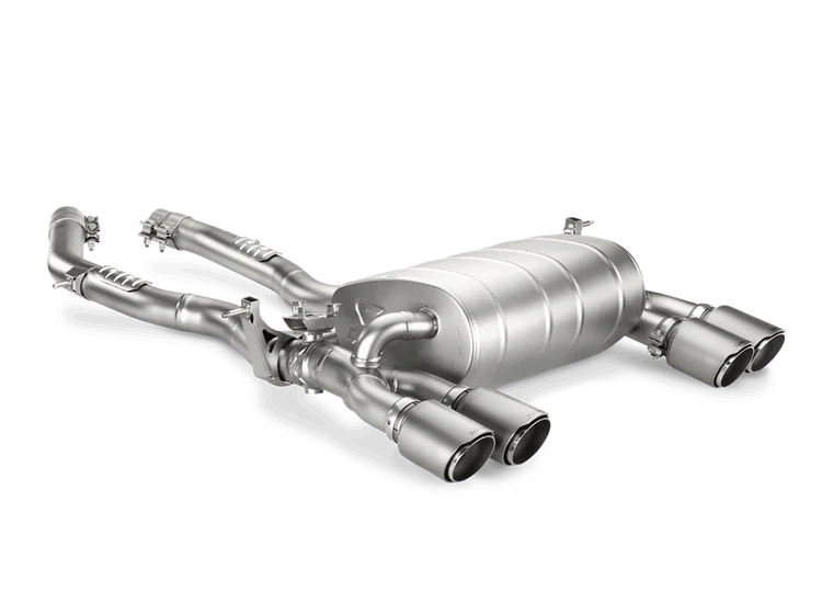 Front side view of an Akrapovic exhaust with twin pipes each side for a BMW M3 M4