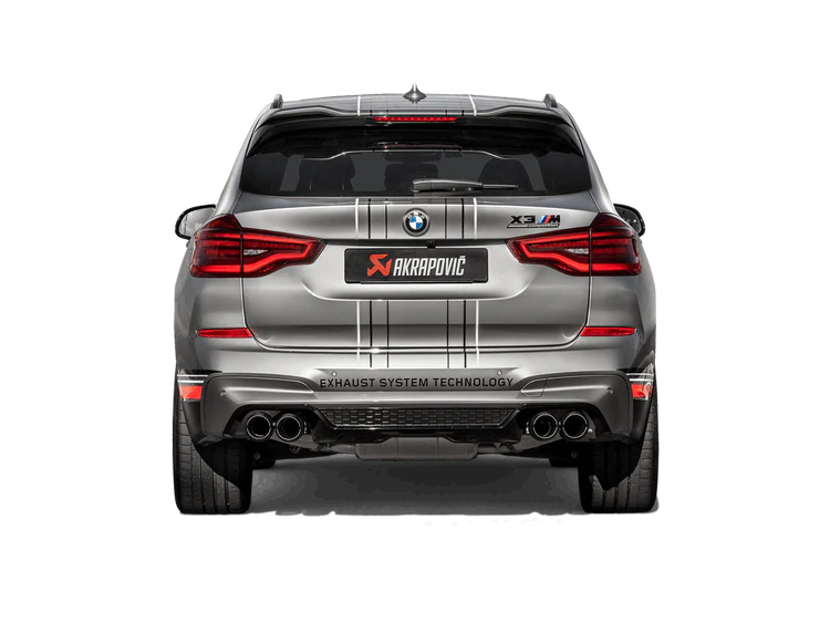 Rear view of a silver BMW X3M with an Akrapovič exhaust with twin pipes each side fitted
