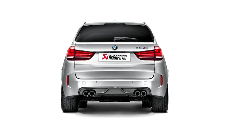 Rear view of a silver BMW X5M with an Akrapovič twin pipes each side exhaust & an Akrapovič carbon fibre rear diffuser fitted