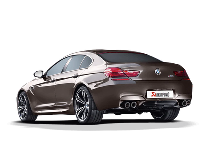 Near side rear view of a brown BMW M6 with an Akrapovic twin pipe each side & carbon fibre tips exhaust fitted