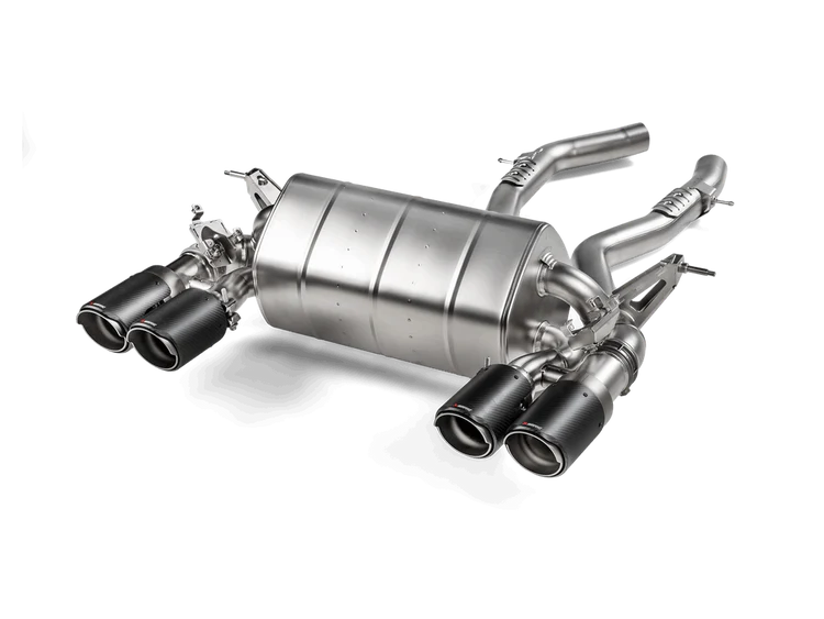 Front aerial view of an Akrapovic titanium rear exhaust section with twin pipes either side, with carbon fibre tips