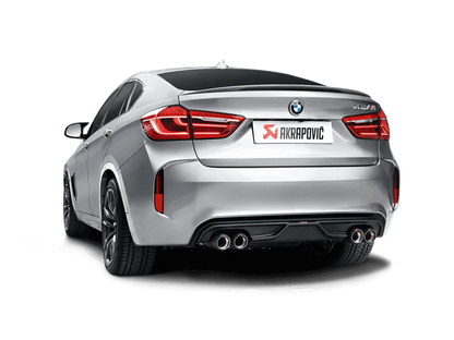 Nearside rear view of a silver BMW X6M with an Akrapovič twin pipes each side exhaust & an Akrapovič carbon fibre rear diffuser fitted