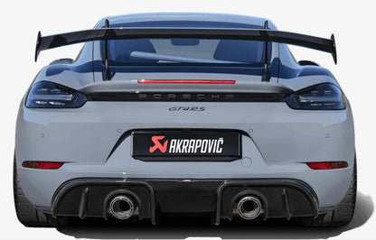 Rear view of a Porsche GT4 RS in Grey with an Akrapovič Carbon Fibre rear diffuser fitted