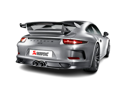 Offside rear view of a silver Porsche 911 991 GT3 with an Akrapovič carbon fibre rear diffuser & Titanium double round tailpipe fitted