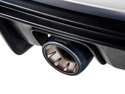 Close up view of an Akrapovič titanium tail pipe with black finish