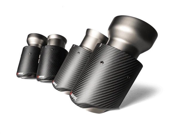 Close up view of an Akrapovič tail pipe set in carbon fibre