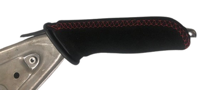 Close up side view of a Toyota GR Yaris handbrake lever handle in black Alcantara with Red stitching