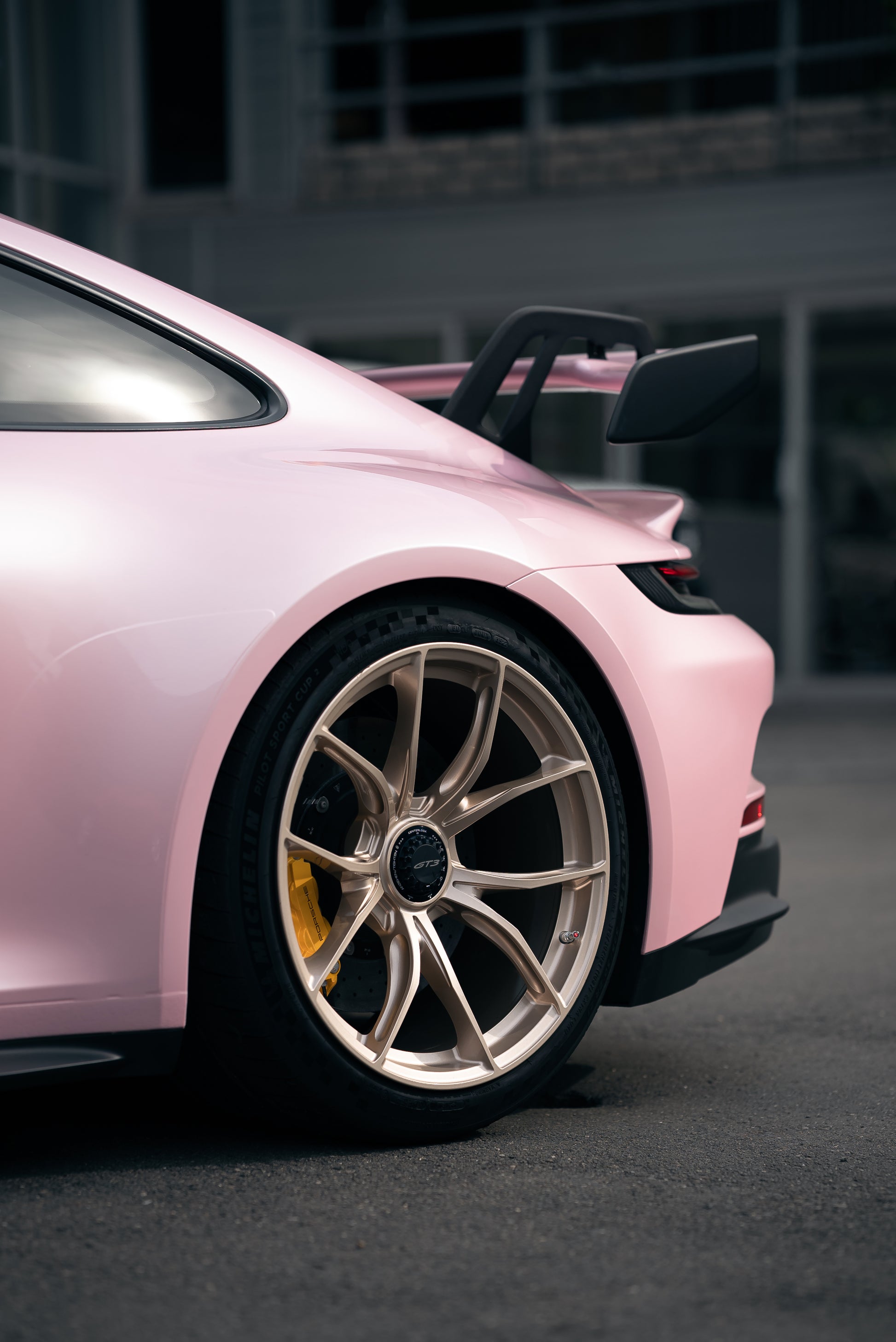 Side view of a Pink Porsche GT3 with an IPE MFR-01 Magnesium wheel fitted