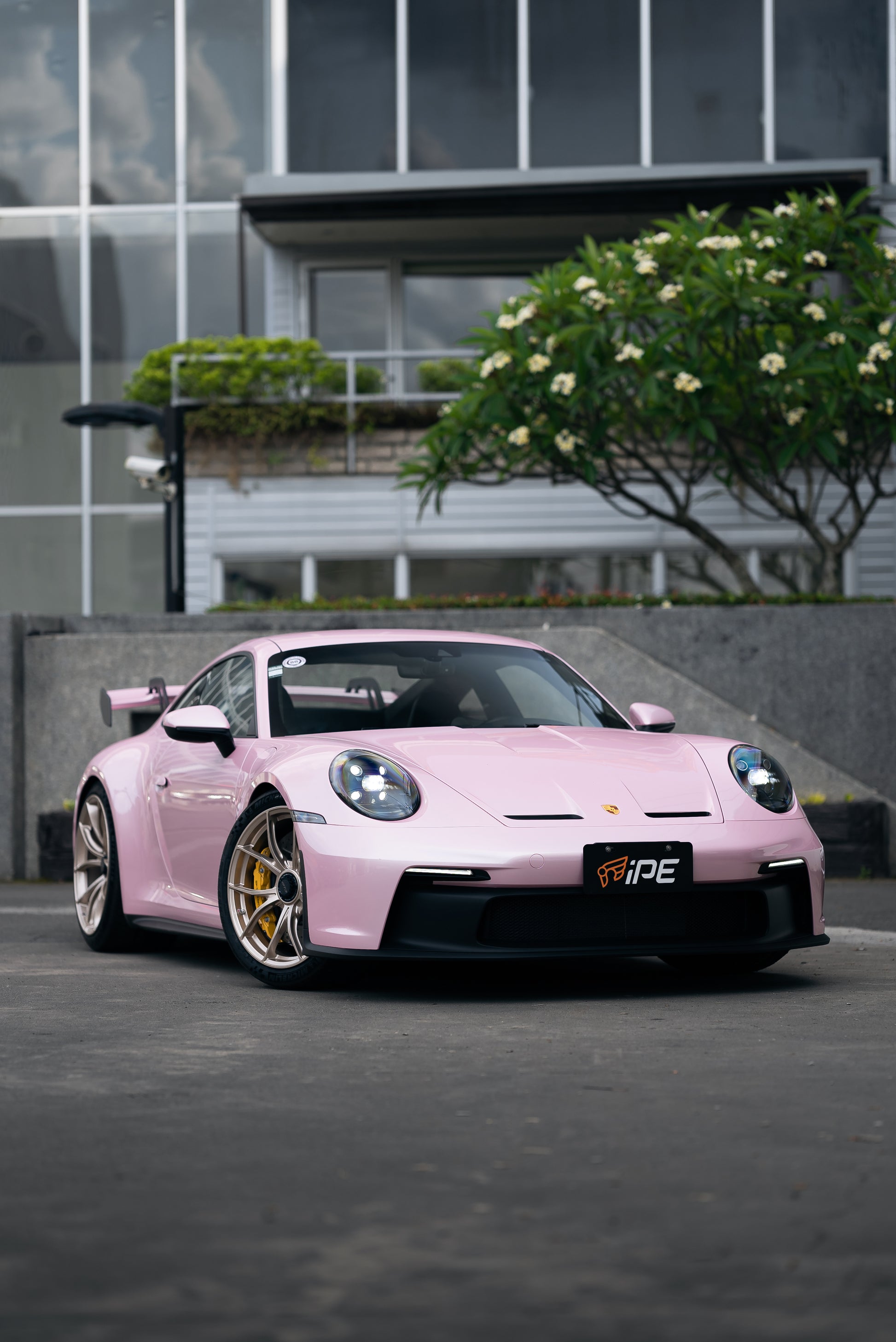 Offside front view of a Pink Porsche GT3 with IPE MFR-01 Magnesium wheels fitted
