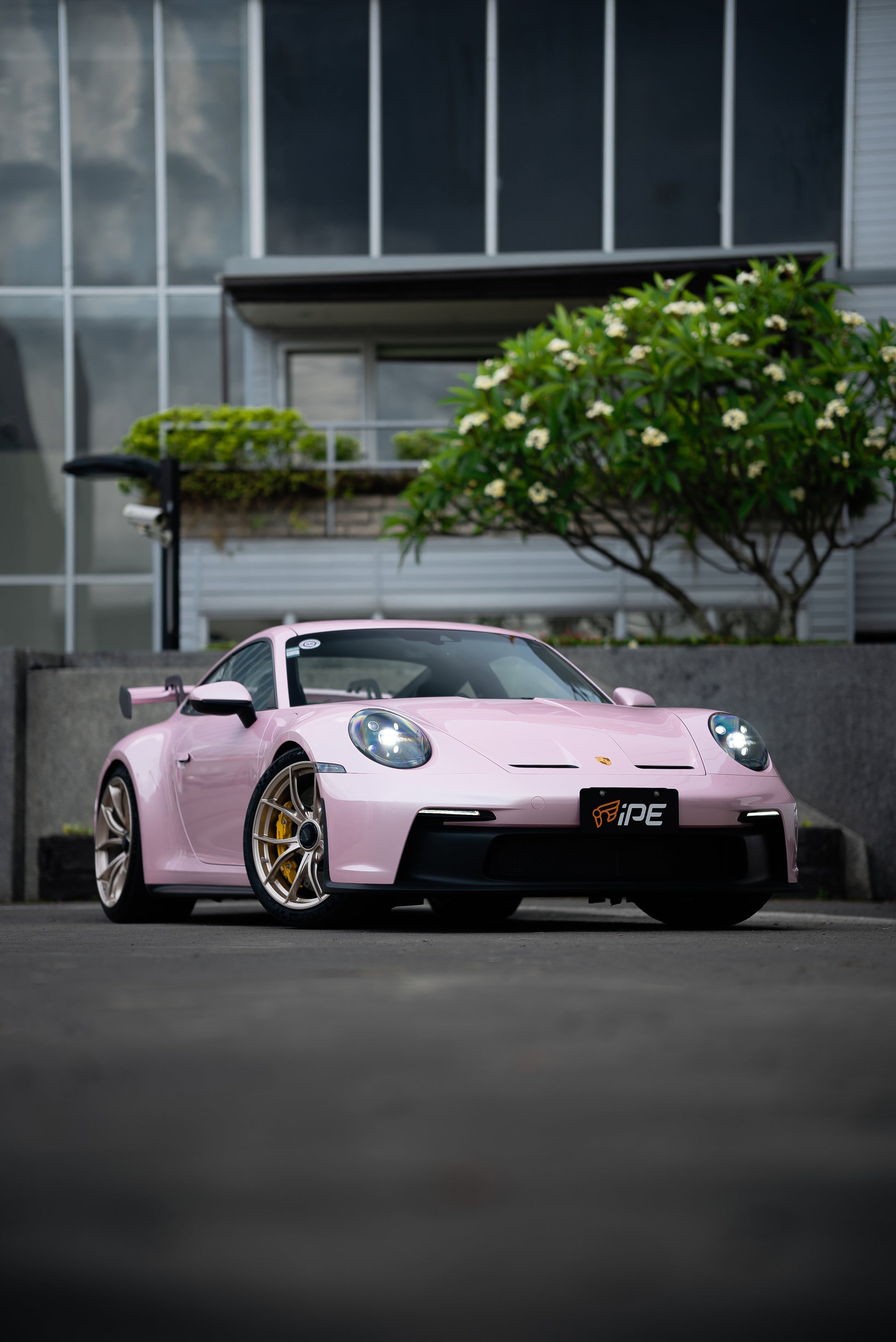 Offside front view of a Pink Porsche GT3 with IPE MFR-01 Magnesium wheels fitted