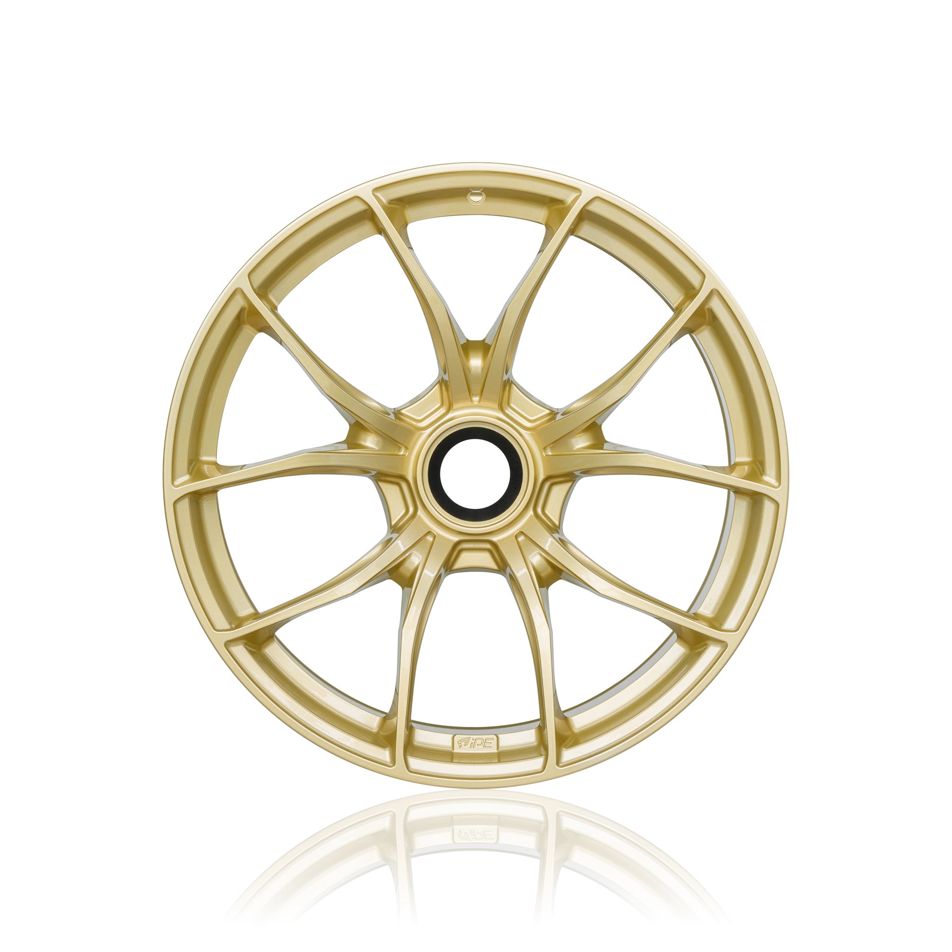 Front view of a gold IPE MFR-01 Magnesium wheel on a white background