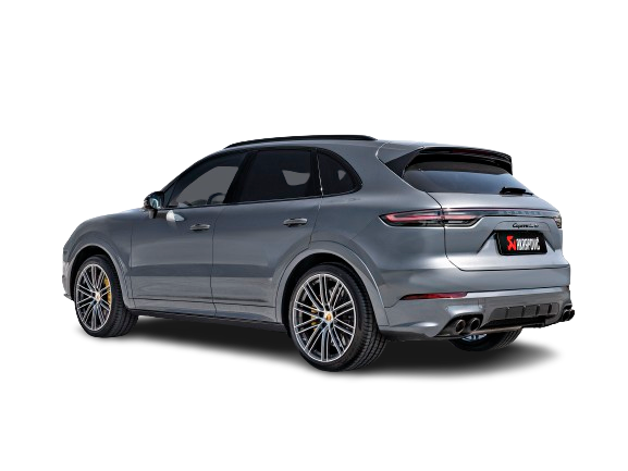 Nearside rear view of a Porsche Cayenne Turbo in silver/white with an Akrapovič Titanium twin, double round carbon fibre tail pipe fitted.