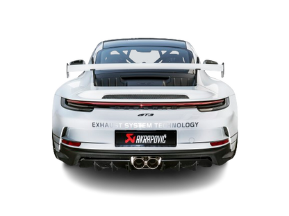 Rear view of a Porsche 911 992 GT3 in white with black trim and an Akrapovič Titanium twin pipe exhaust fitted