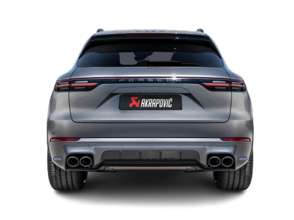 Rear view of a Porsche Cayenne Turbo in silver/white with an Akrapovič Titanium twin, double round carbon fibre tail pipe fitted.