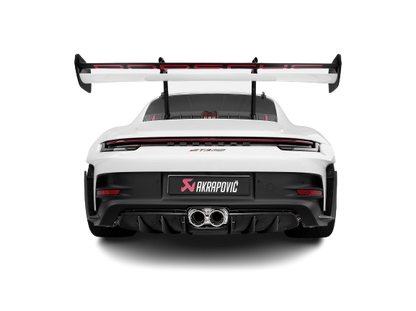 Rear view of a Porsche 911 992 GT3 RS in white with black trim and an Akrapovič Titanium twin pipe exhaust fitted