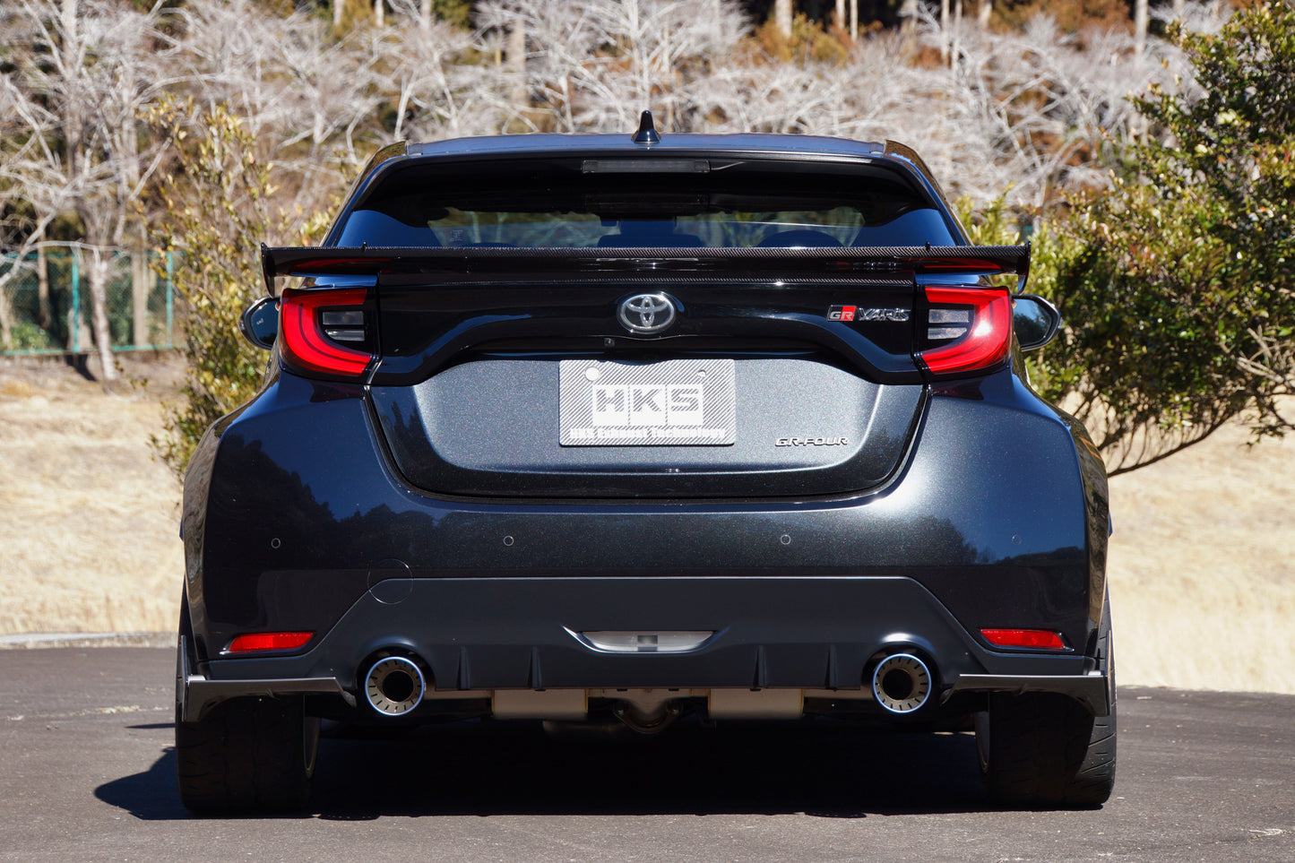 Rear view of a Black Toyota GR Yaris with a HKS twin pipe exhaust fitted