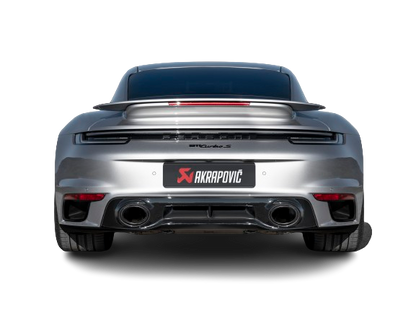 Rear view of a Silver Porsche 911 Turbo 992 with an Akrapovič tail pipe set fitted