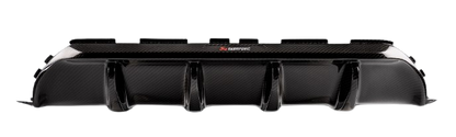 Front view of an Akrapovic rear carbon fibre diffuser with a high gloss finish