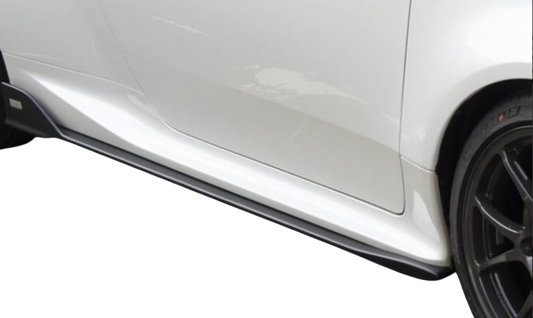 Offside view of a Tom's side diffuser fitted to a white Toyota GR Yaris
