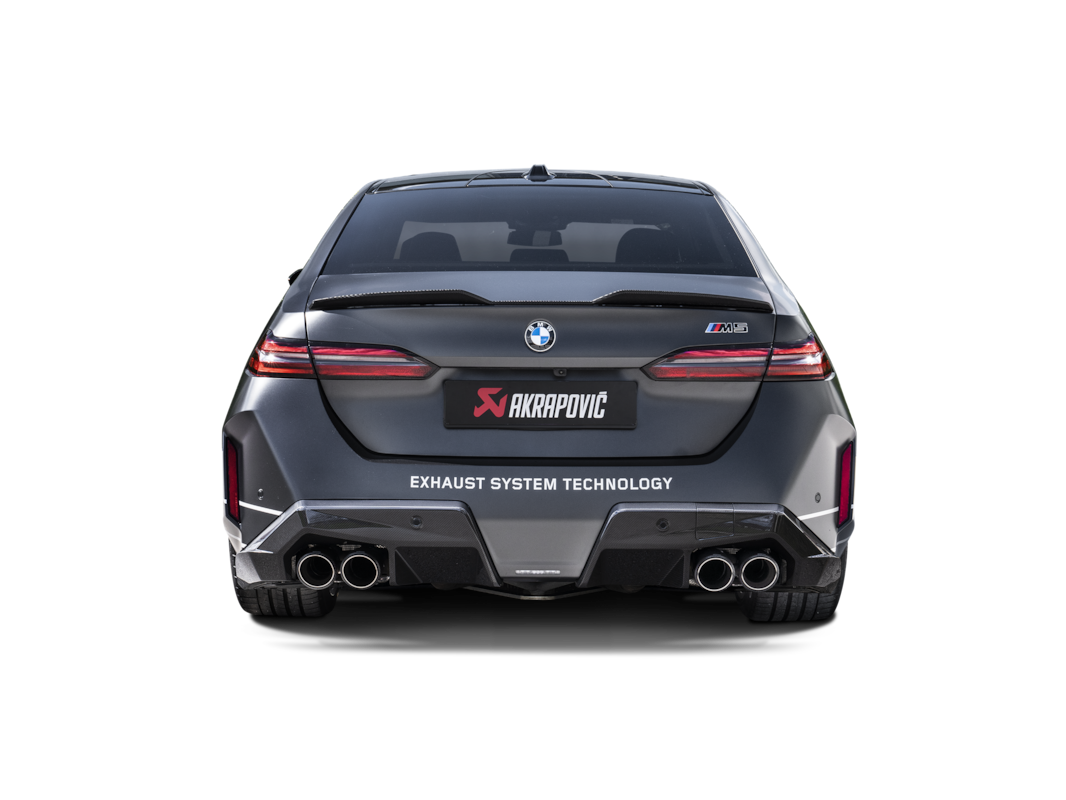 BMW M5 G90 nearside rear view with Akrapovic diffuser