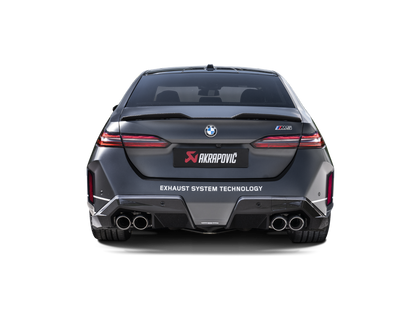 BMW M5 G90 nearside rear view with Akrapovic diffuser